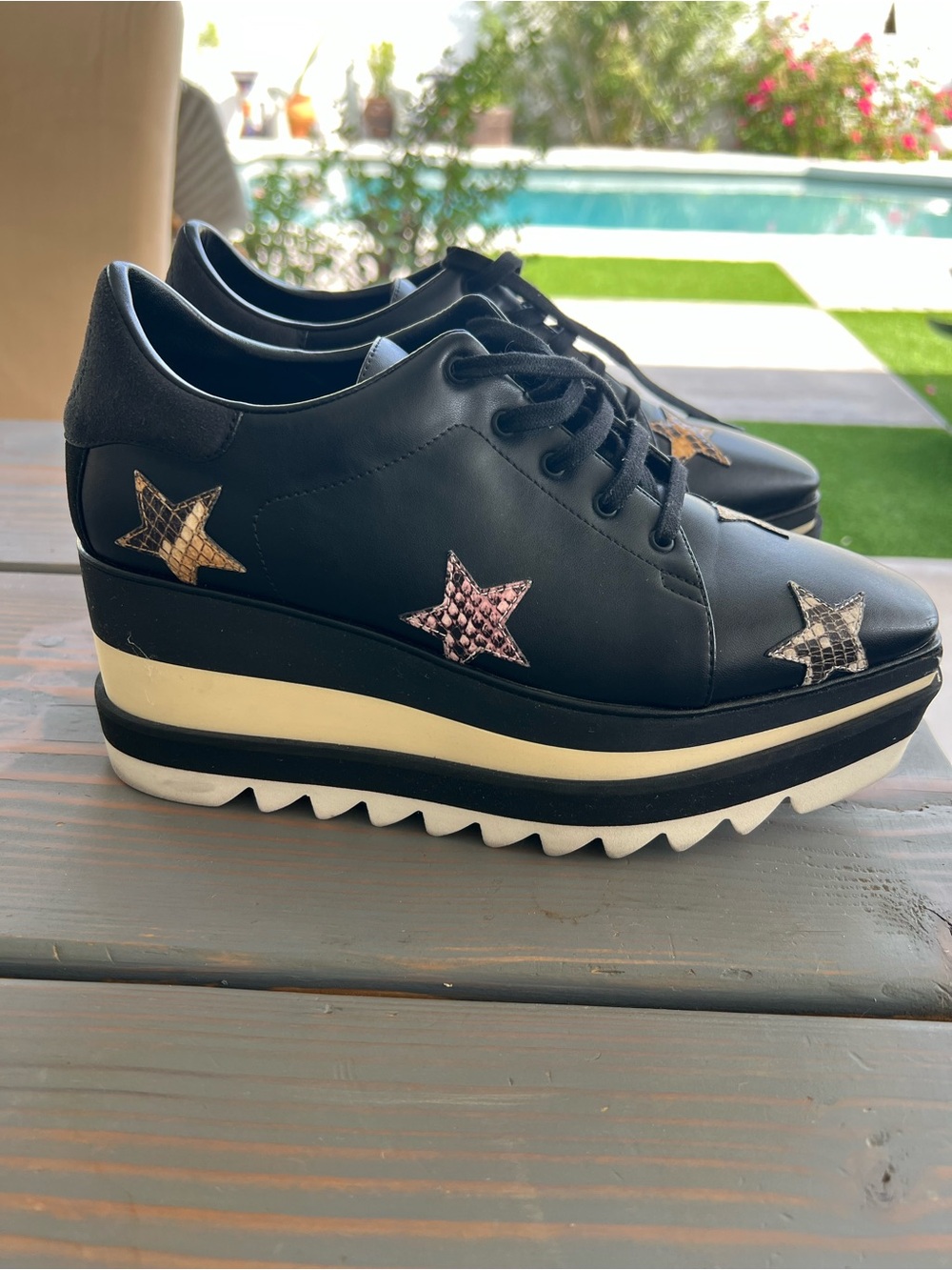 Stella McCartney Black Platform Lace-Up Sneakers with Star Appliqués